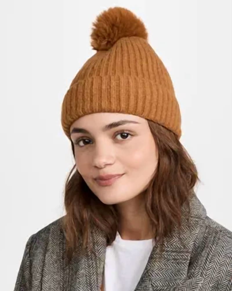 Front of a model wearing a size one-size-fits-all All Occasion Beanie Hat In Rust in Rust by Hat Attack. | dia_product_style_image_id:351481